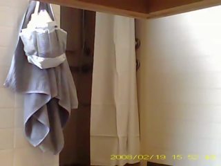 Spying captivating 19 year old young female showering in dorm bathroom